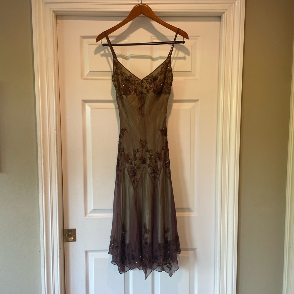 A beautiful olive green and brown dress kneee high